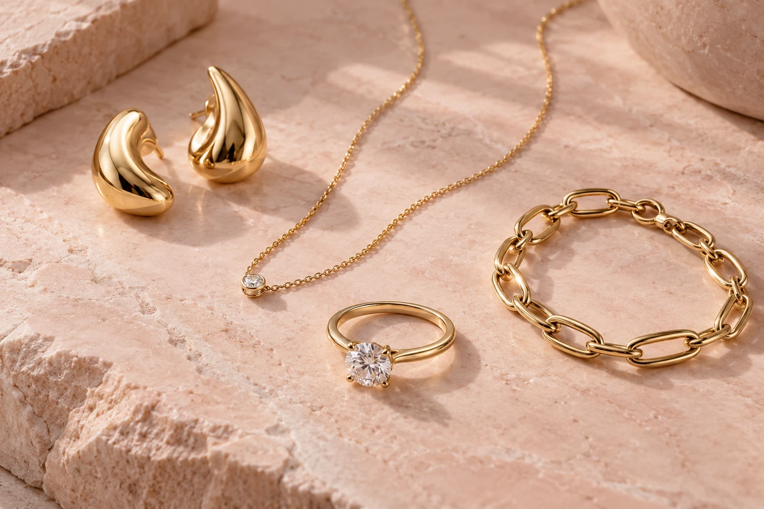 Gold pendant necklace arranged with a jewelry edit